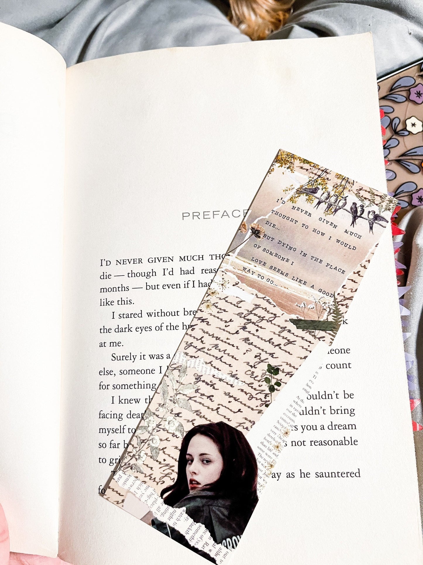 Twilight Inspired collage bookmark of Bella Swan with a scrapbook aesthetic. Includes the quote "I'd never given much thought to how I would die. But dying in place of someone I love, seems like a good way to go”.