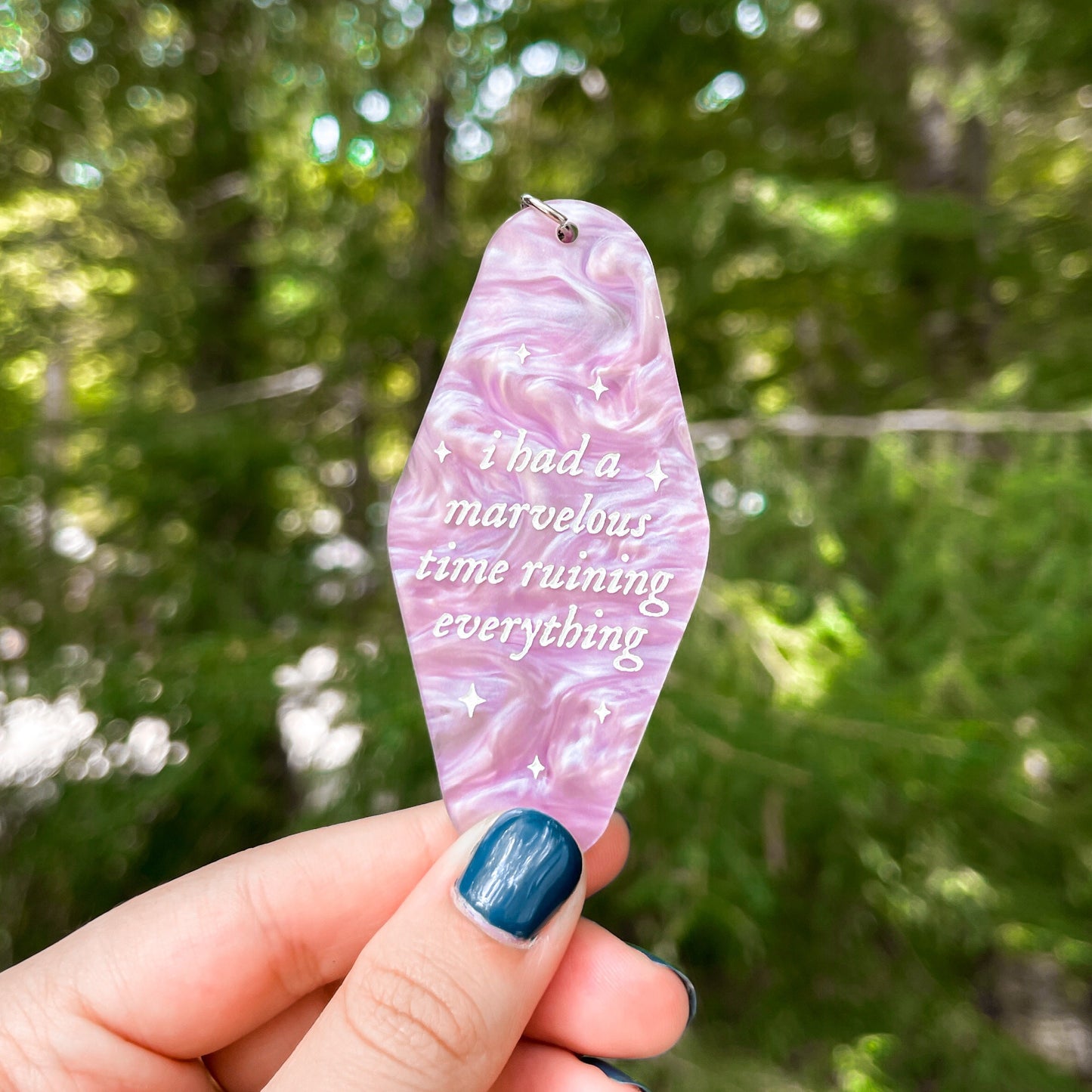Aesthetic marble acrylic keychain with the lyrics "i had a marvelous time ruining everything" inspired by Taylor Swift's Folklore song "The Last Great American Dynasty".
