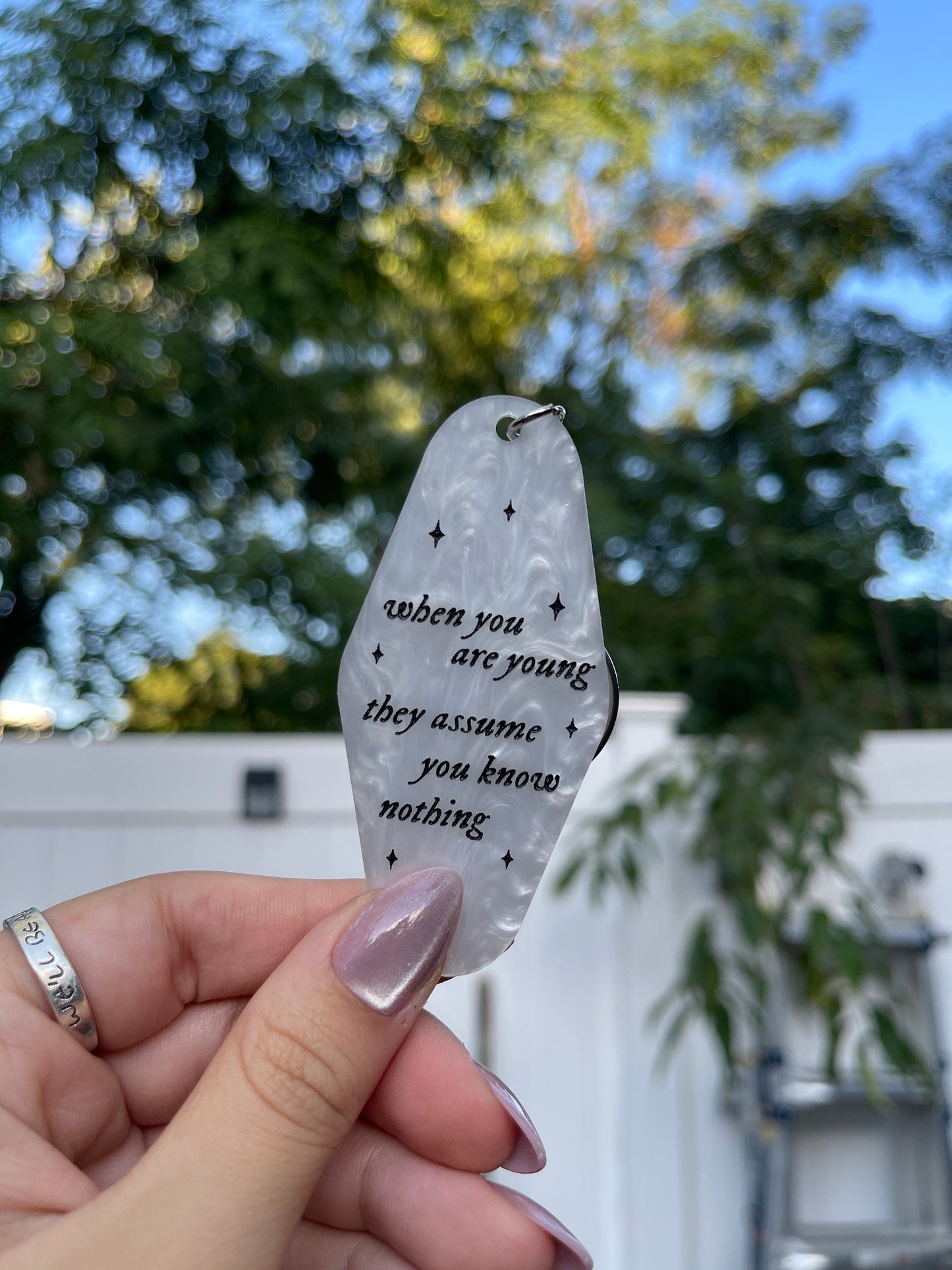 They Assume You Know Nothing Keychain