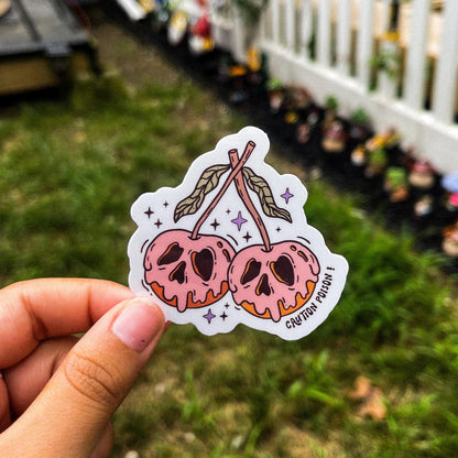 A cozy fall aesthetic halloween sticker of poisonous fruit.