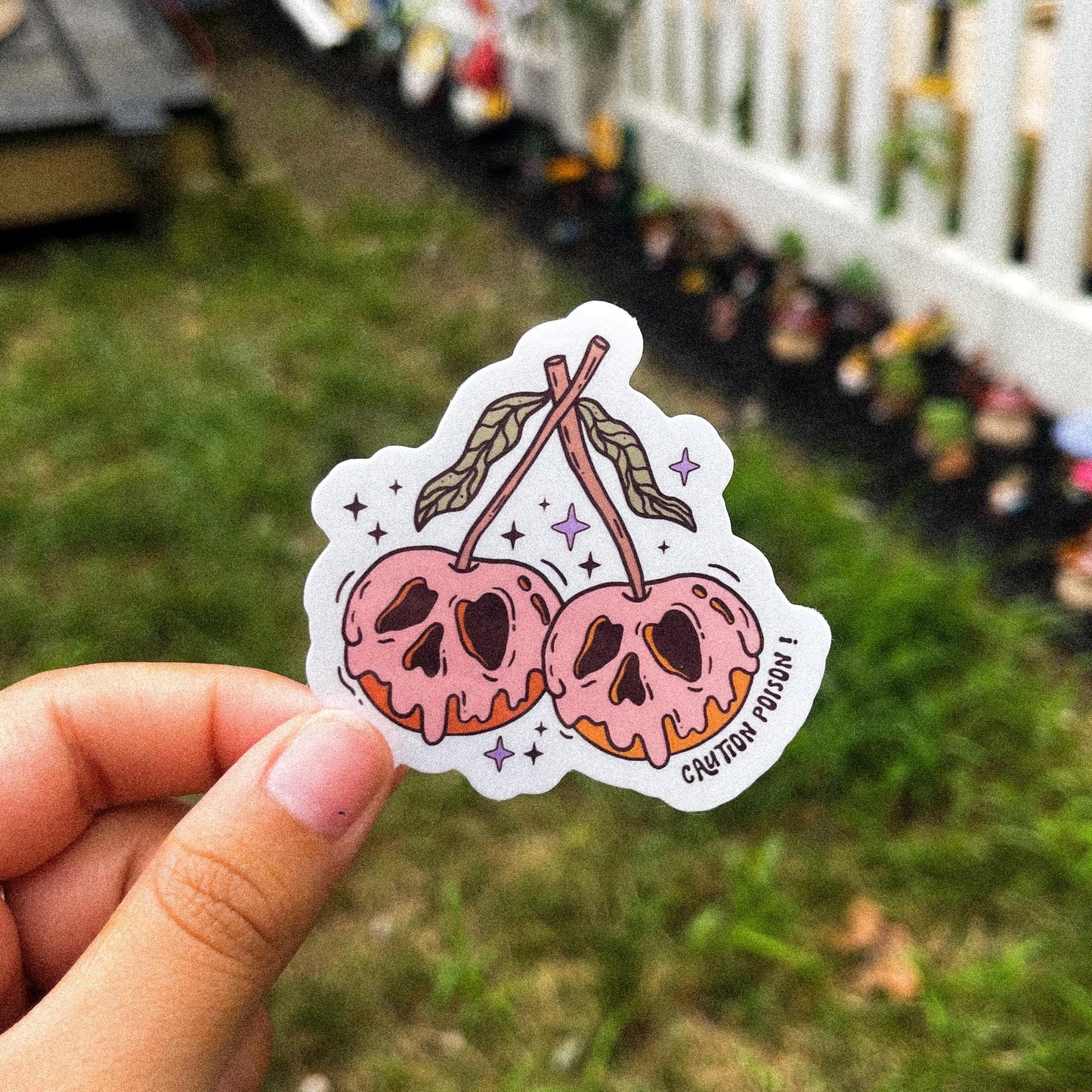 A cozy fall aesthetic halloween sticker of poisonous fruit.